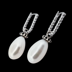 Collection of Fresh Water Pearl Studded Dangle Earrings in a gallery layout