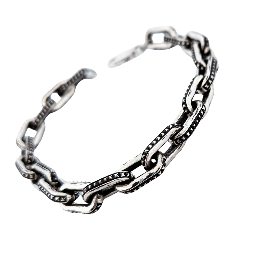 Collection of Studded Link Sterling Silver Bracelet in a gallery layout