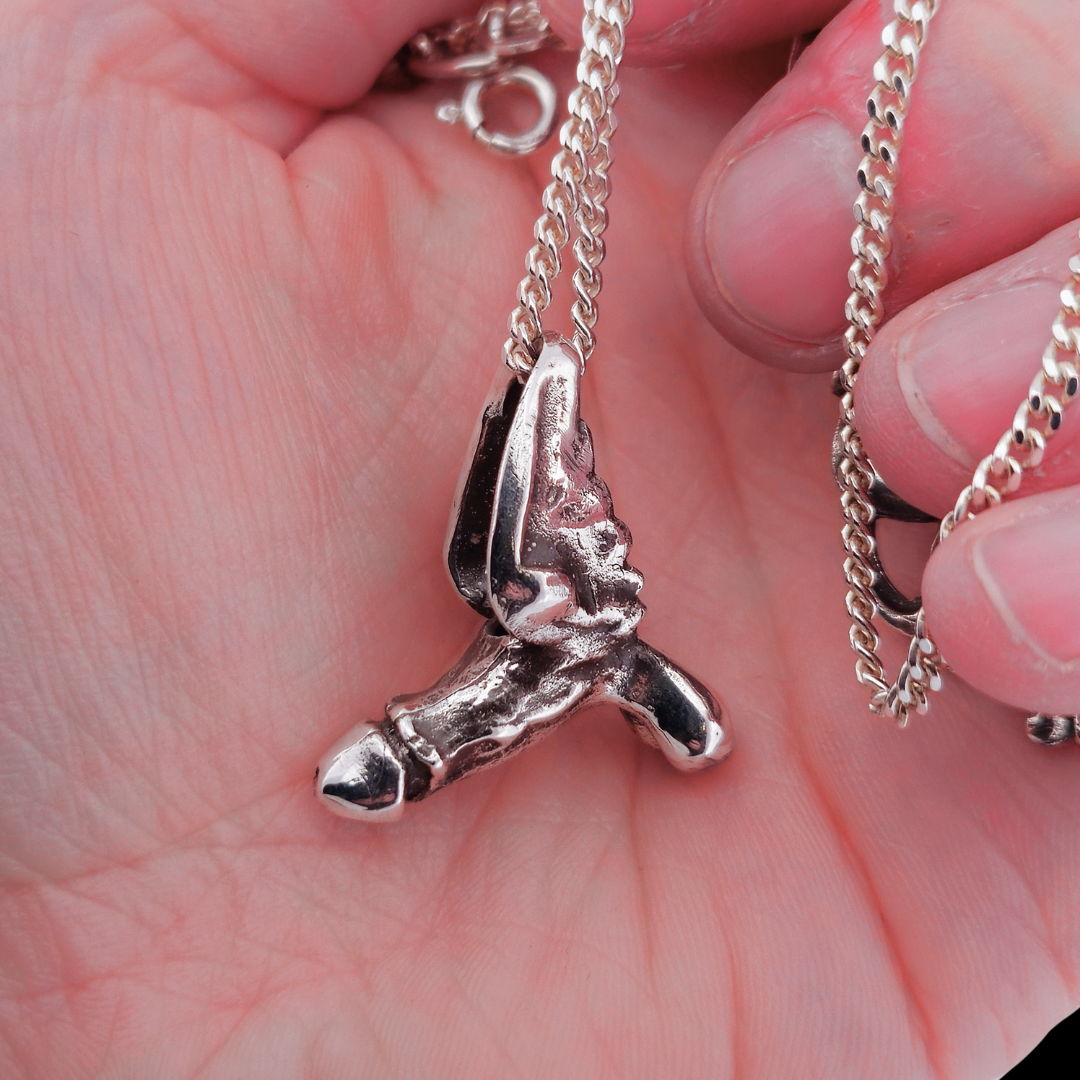 Collection of Winged Phallus Flying Dick Pendant Sterling Silver in a gallery layout
