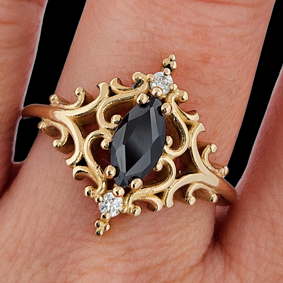 Collection of La Marquise Ring - Gold, Black Onyx and Diamonds in a gallery layout