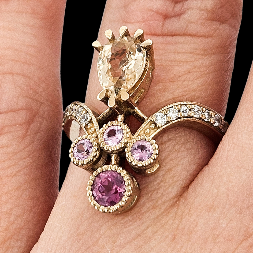 Collection of Antique Pear Ring - Gold, Color Change Garnet, Sapphire in a gallery layout