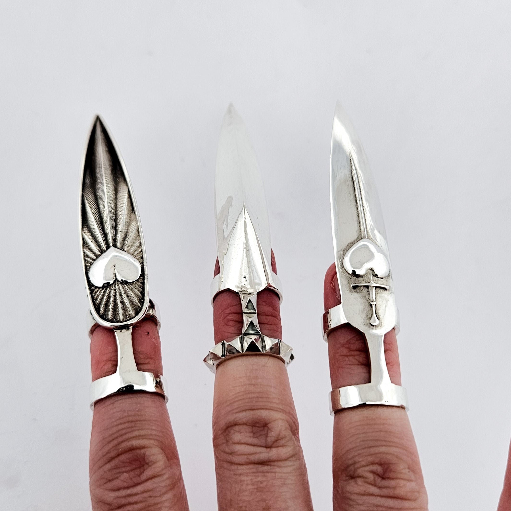 Collection of Oversized Heart & Sword Claw - Fake Nail Ring in a gallery layout