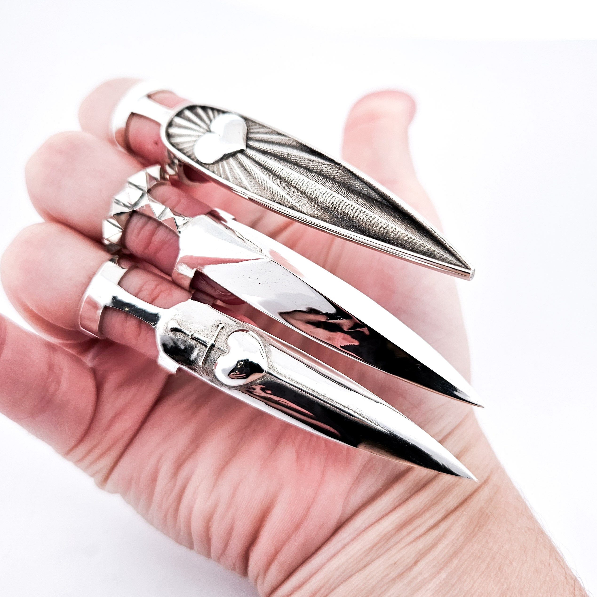 Collection of Oversized Heart & Sword Claw - Fake Nail Ring in a gallery layout