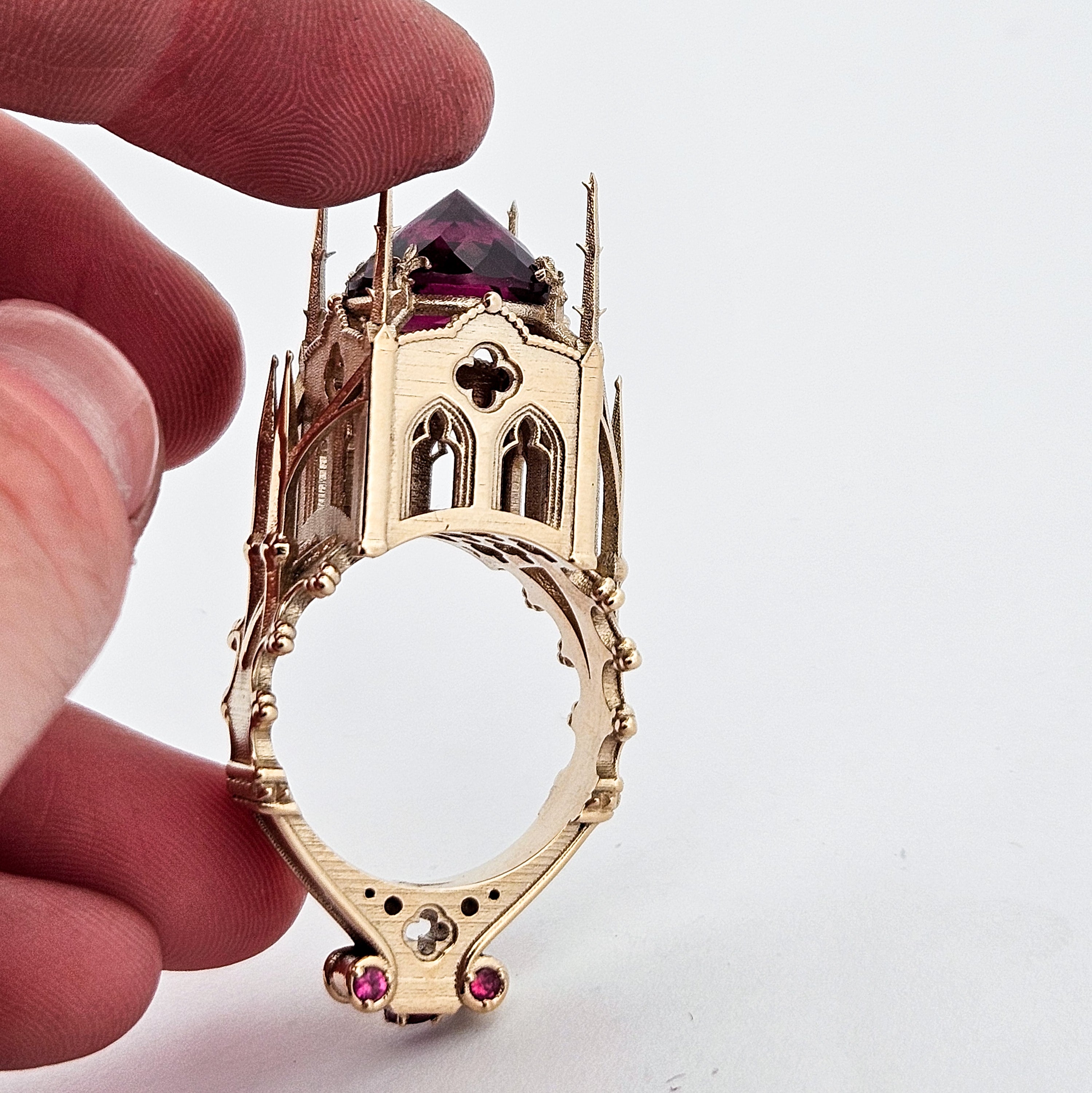 Collection of The Temple of Temptations - 14K Yellow Gold, Raspberry Garnet, Pink Spinelle and Ruby Ring in a gallery layout