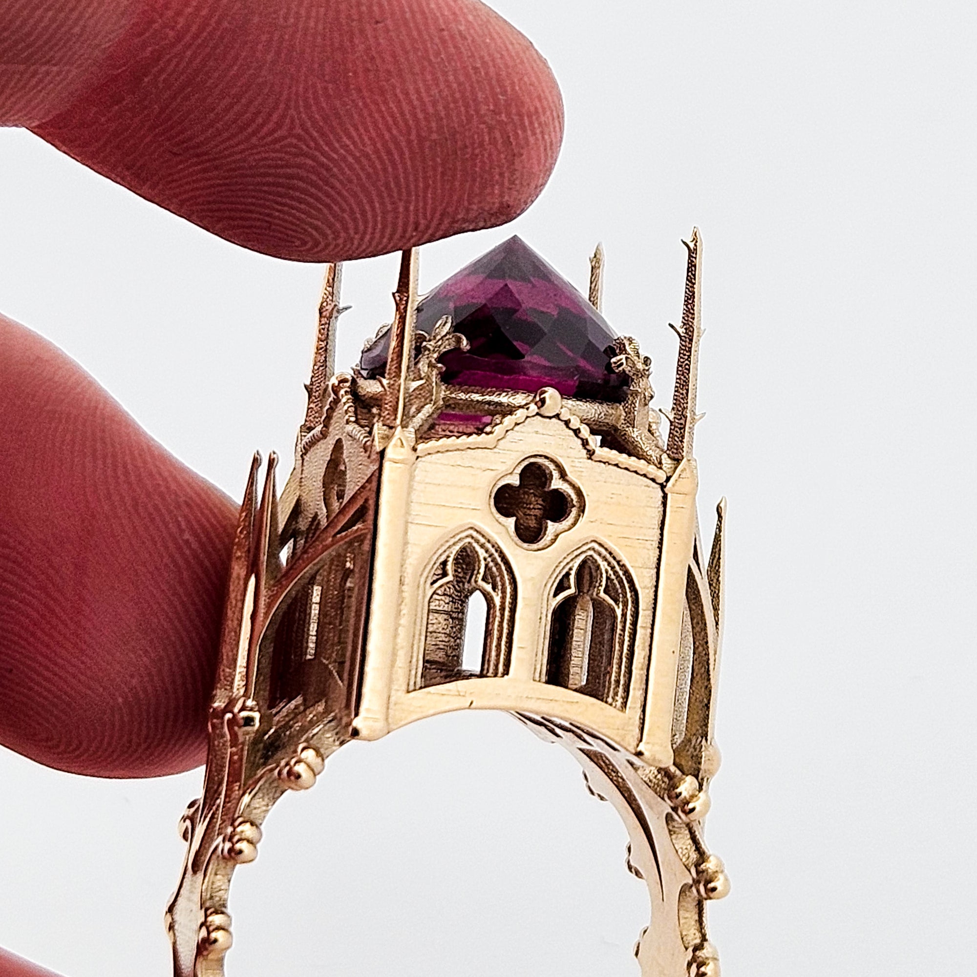 Collection of The Temple of Temptations - 14K Yellow Gold, Raspberry Garnet, Pink Spinelle and Ruby Ring in a gallery layout