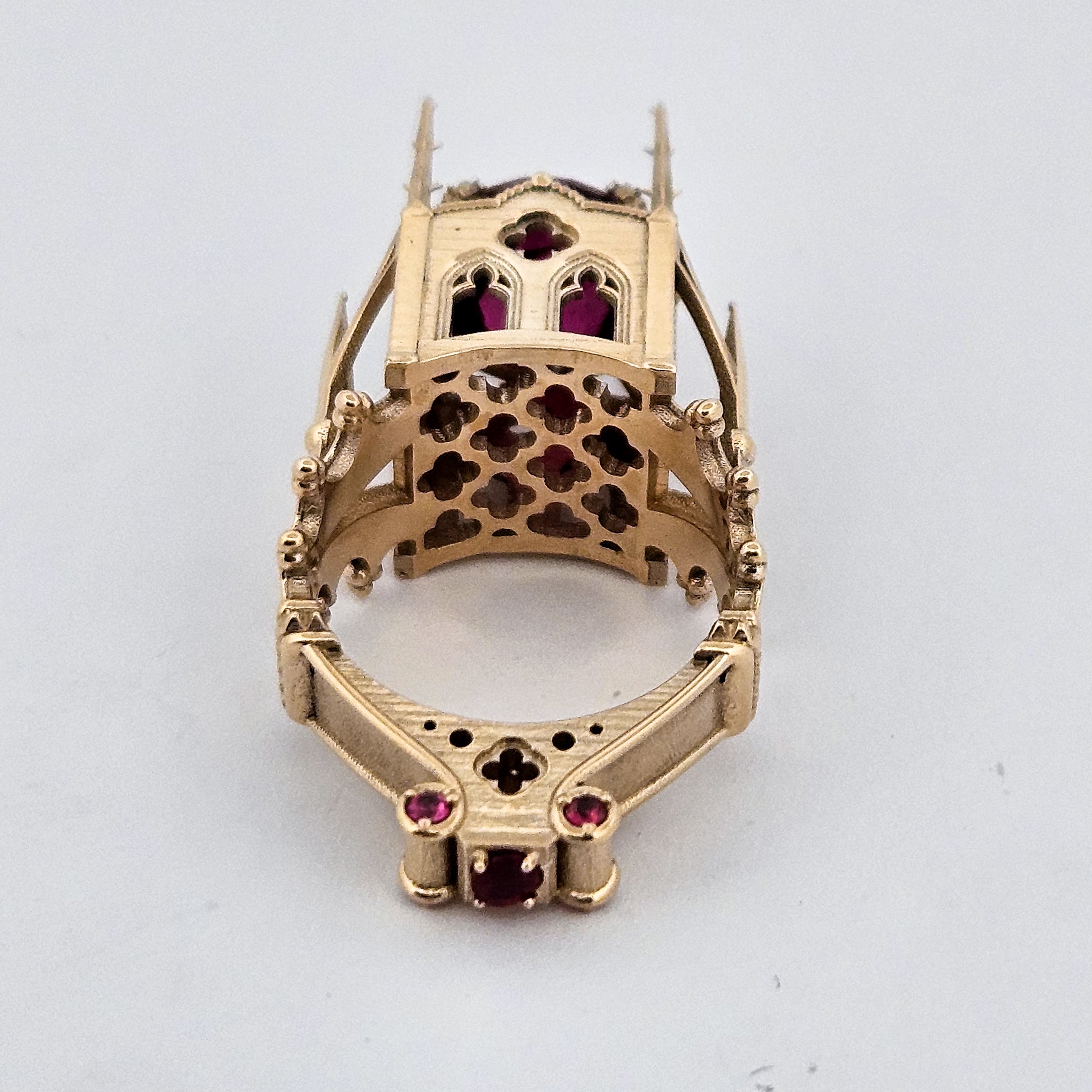 Collection of The Temple of Temptations - 14K Yellow Gold, Raspberry Garnet, Pink Spinelle and Ruby Ring in a gallery layout