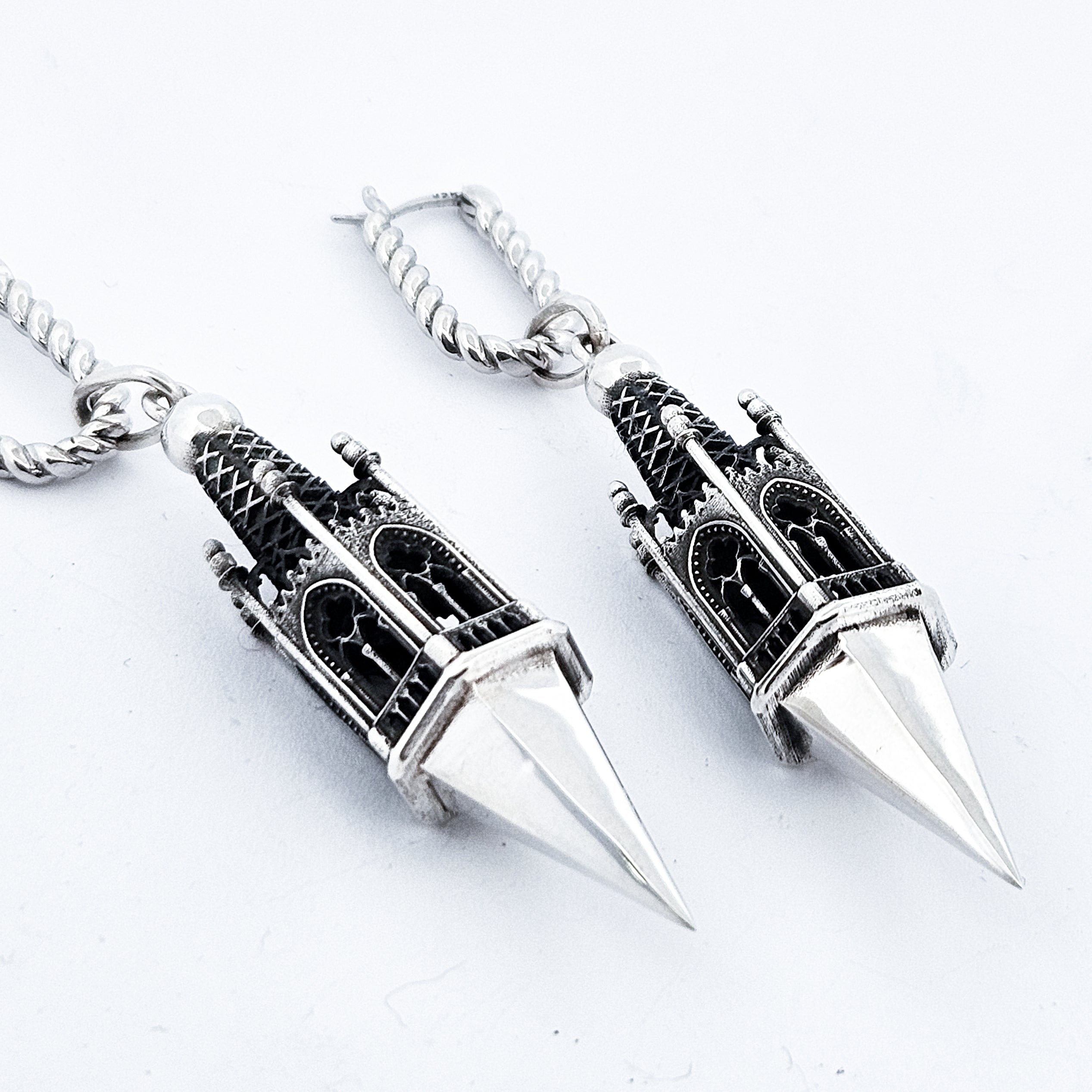 Collection of Gothic Tower Pyramid Dangling Earrings in a gallery layout