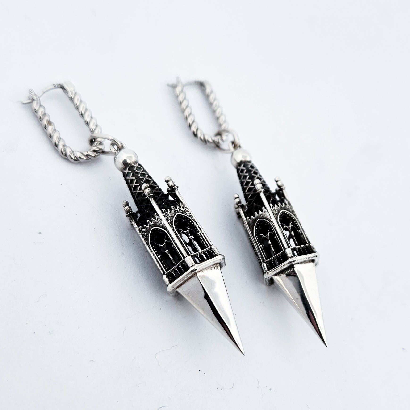 Collection of Gothic Tower Pyramid Dangling Earrings in a gallery layout