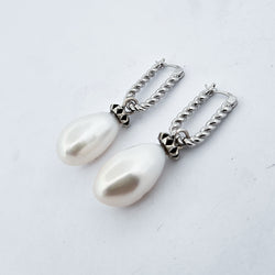 Collection of Fresh Water Pearl Studded Dangle Earrings in a gallery layout