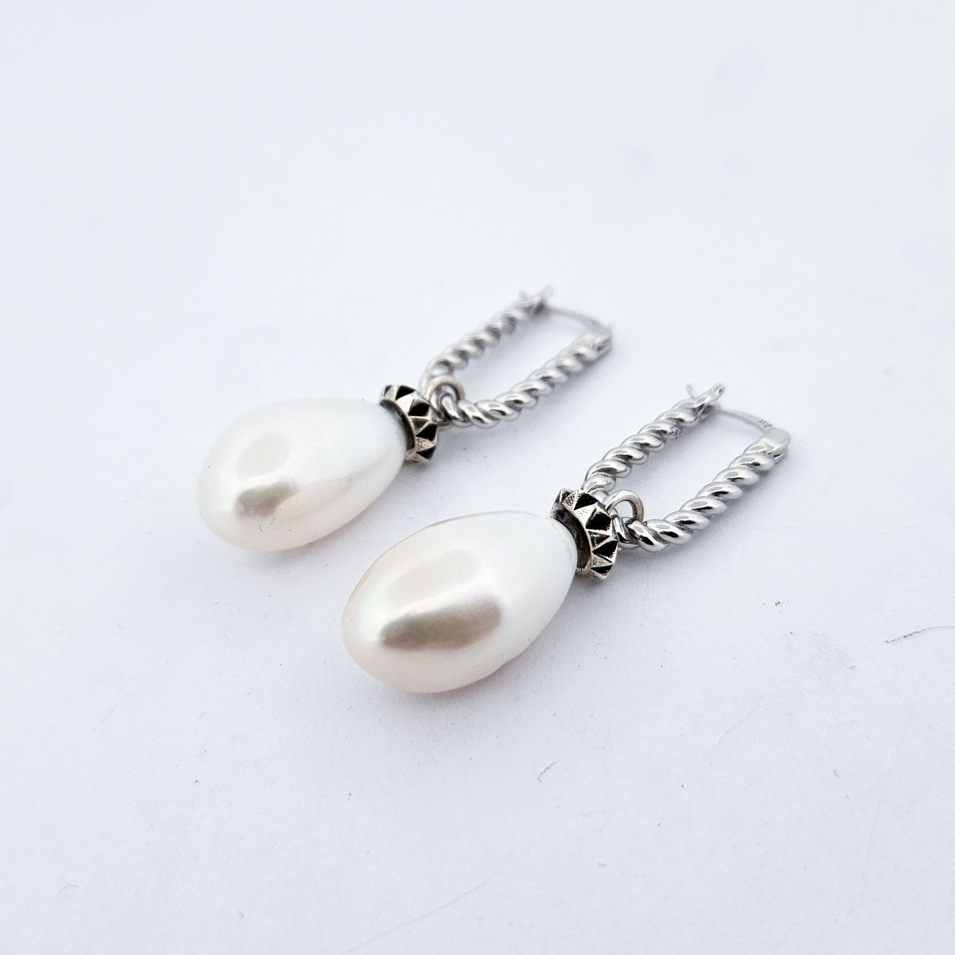 Collection of Fresh Water Pearl Studded Dangle Earrings in a gallery layout