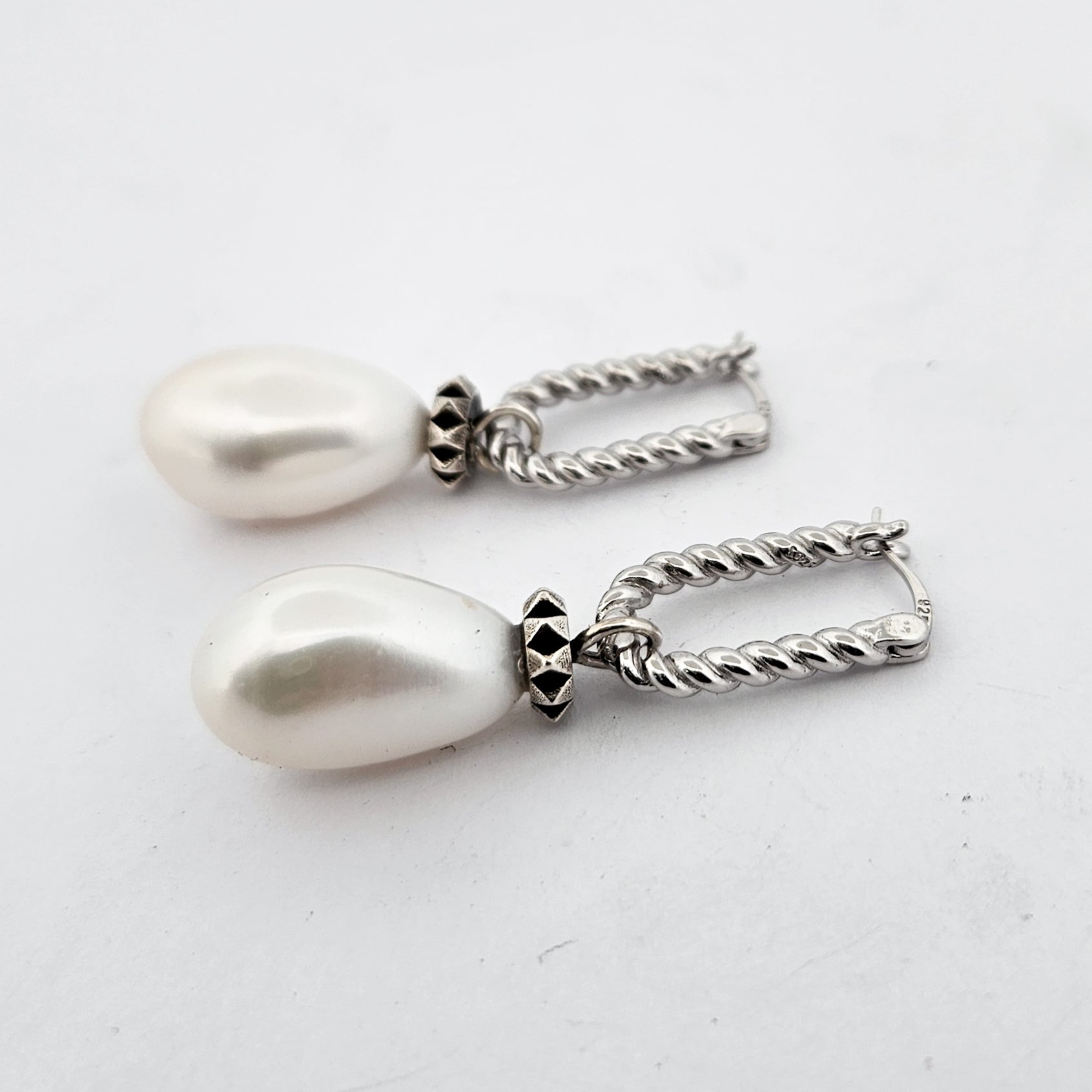 Collection of Fresh Water Pearl Studded Dangle Earrings in a gallery layout