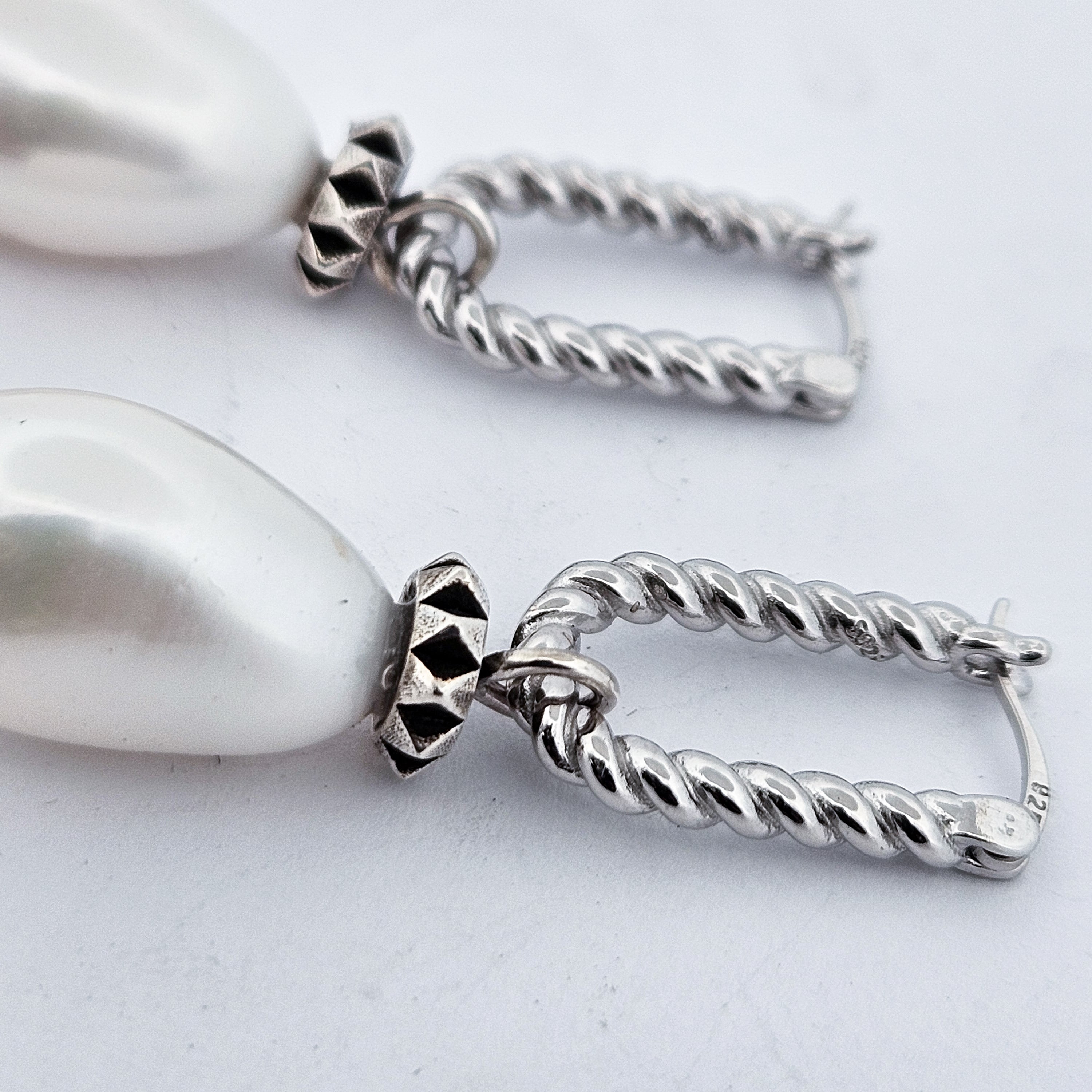 Collection of Fresh Water Pearl Studded Dangle Earrings in a gallery layout