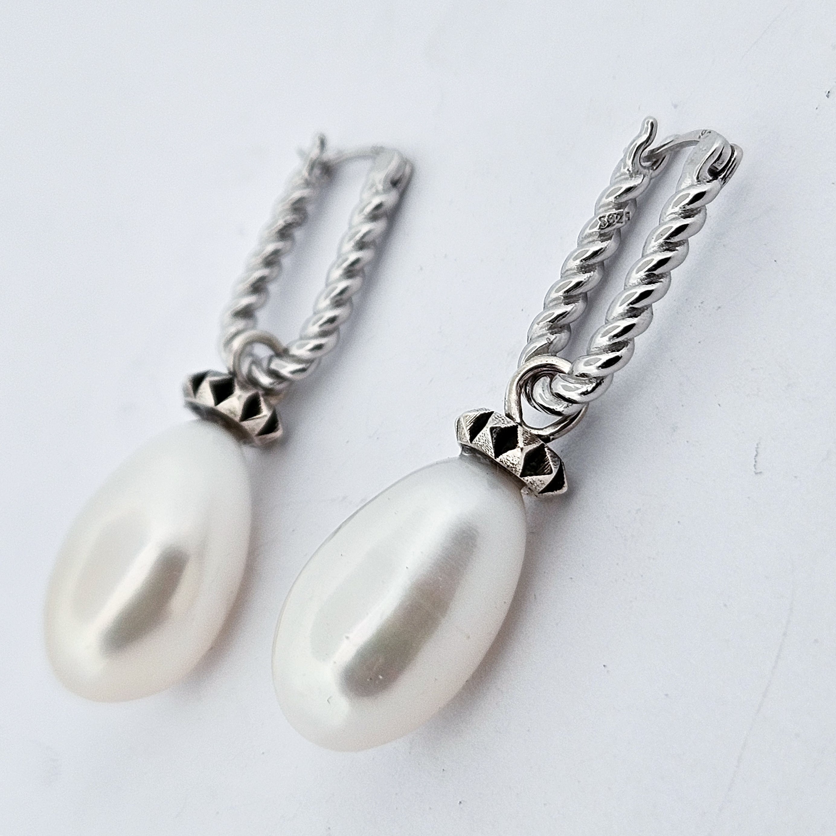 Collection of Fresh Water Pearl Studded Dangle Earrings in a gallery layout