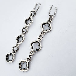 Collection of Quatre foils Dangling Silver Earrings in a gallery layout