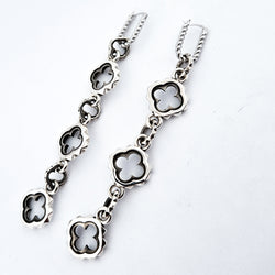 Collection of Quatre foils Dangling Silver Earrings in a gallery layout