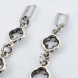 Collection of Quatre foils Dangling Silver Earrings in a gallery layout