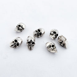 Collection of Sterling Silver Skull Buttons in a gallery layout