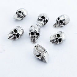 Collection of Sterling Silver Skull Buttons in a gallery layout