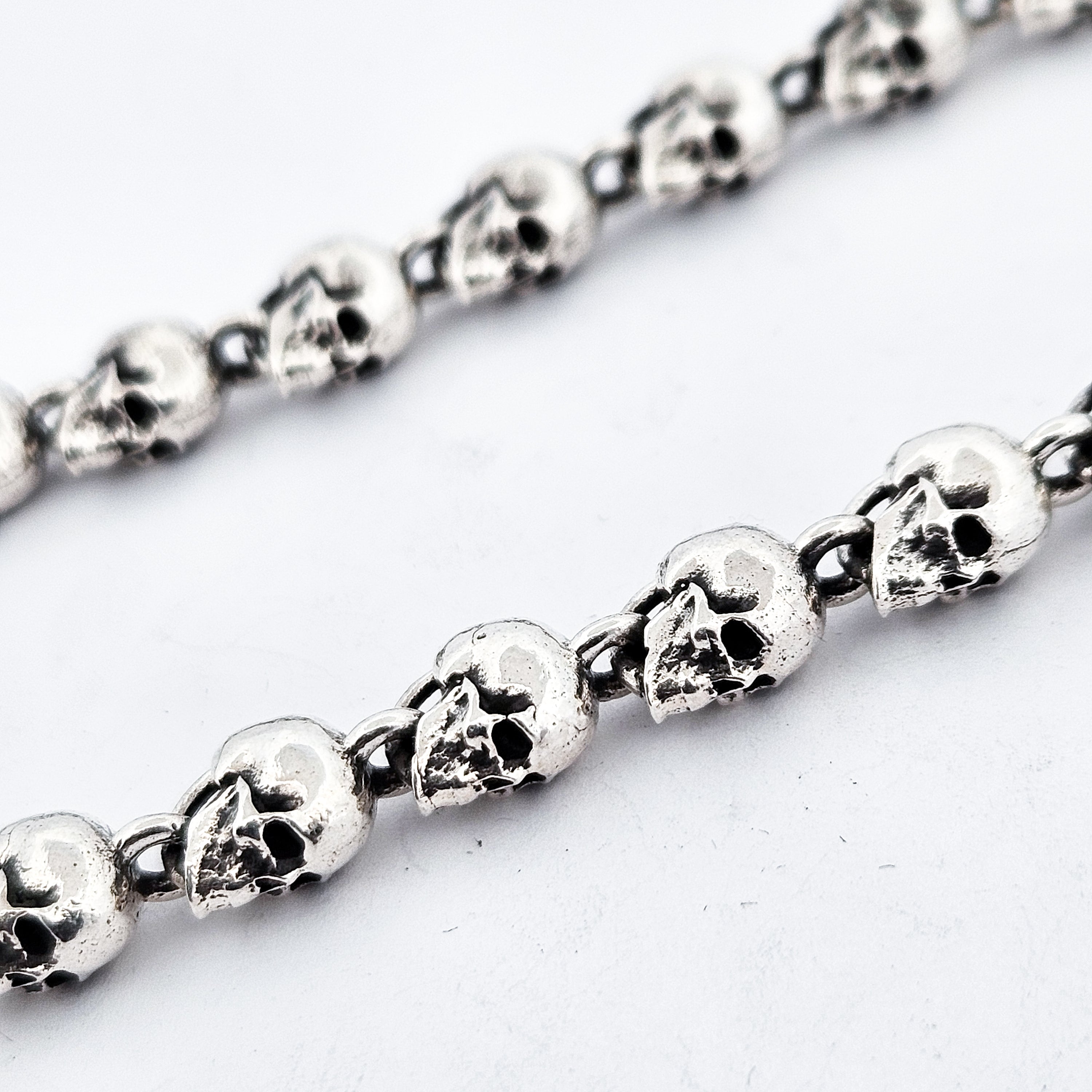 Collection of Small Sterling Silver Skull Bracelet in a gallery layout