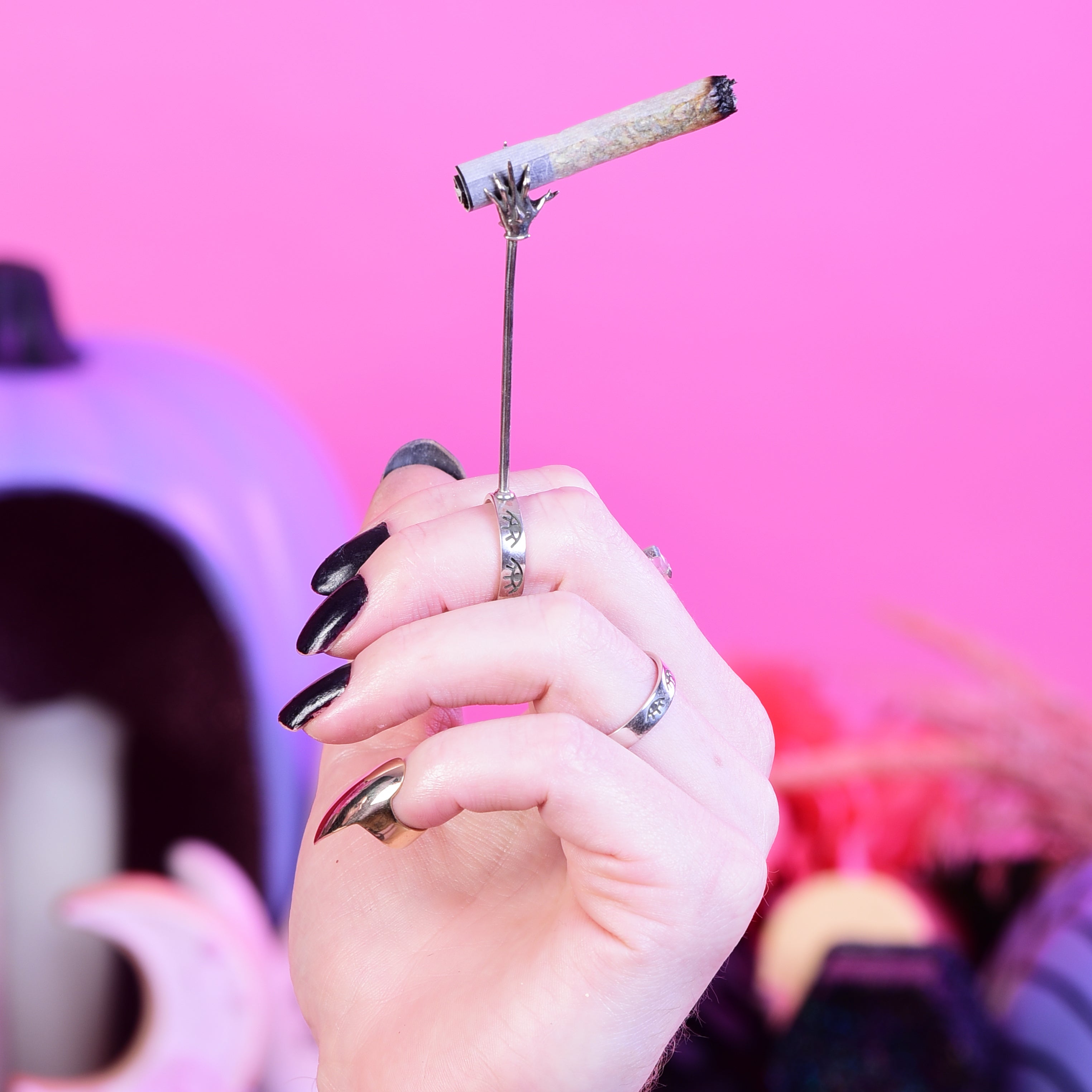 Collection of Queen of Hell Sceptre Cigarette Blunt Holder Ring in a gallery layout