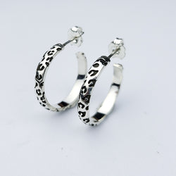 Collection of Thin Leopard Print Hoop Earrings in a gallery layout