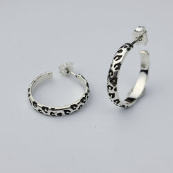 Collection of Thin Leopard Print Hoop Earrings in a gallery layout