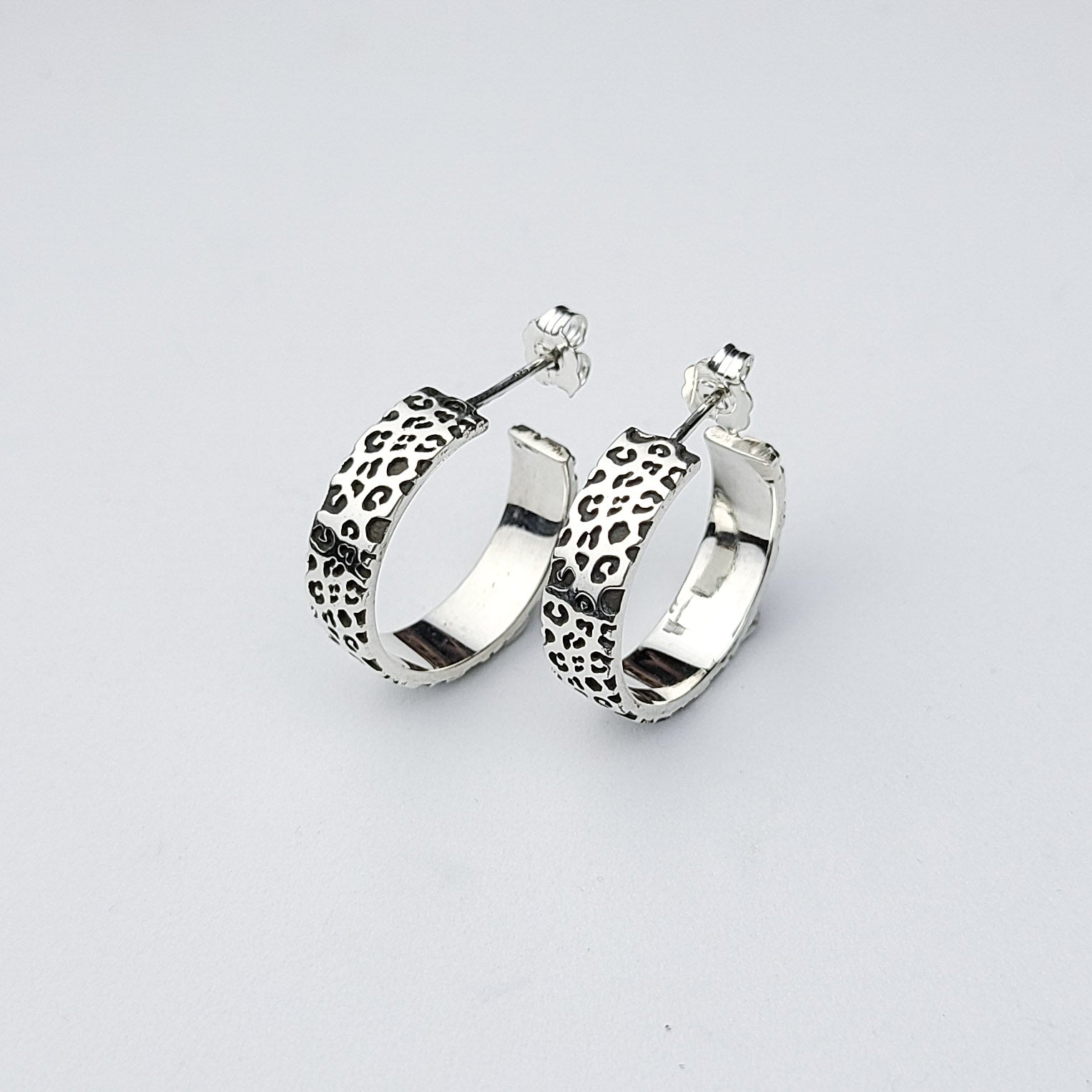 Collection of 6mm Wide Leopard Print Hoop Earrings in a gallery layout