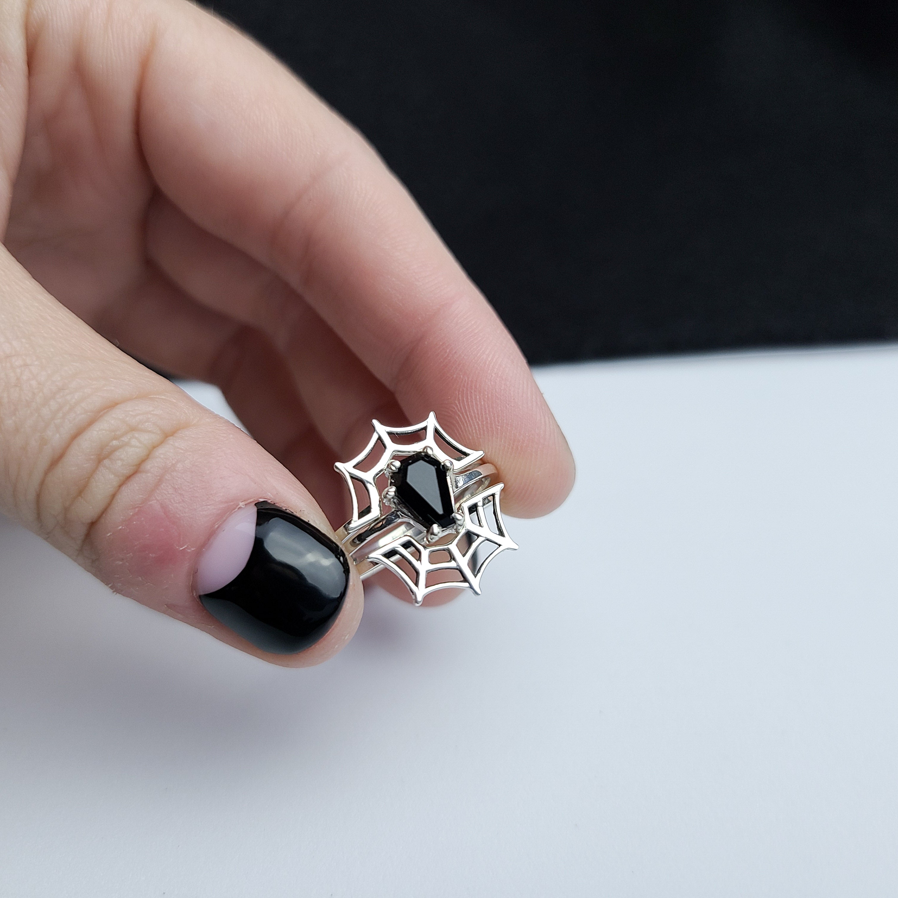 Collection of Black Coffin & Spider Web Ring Set in a gallery layout