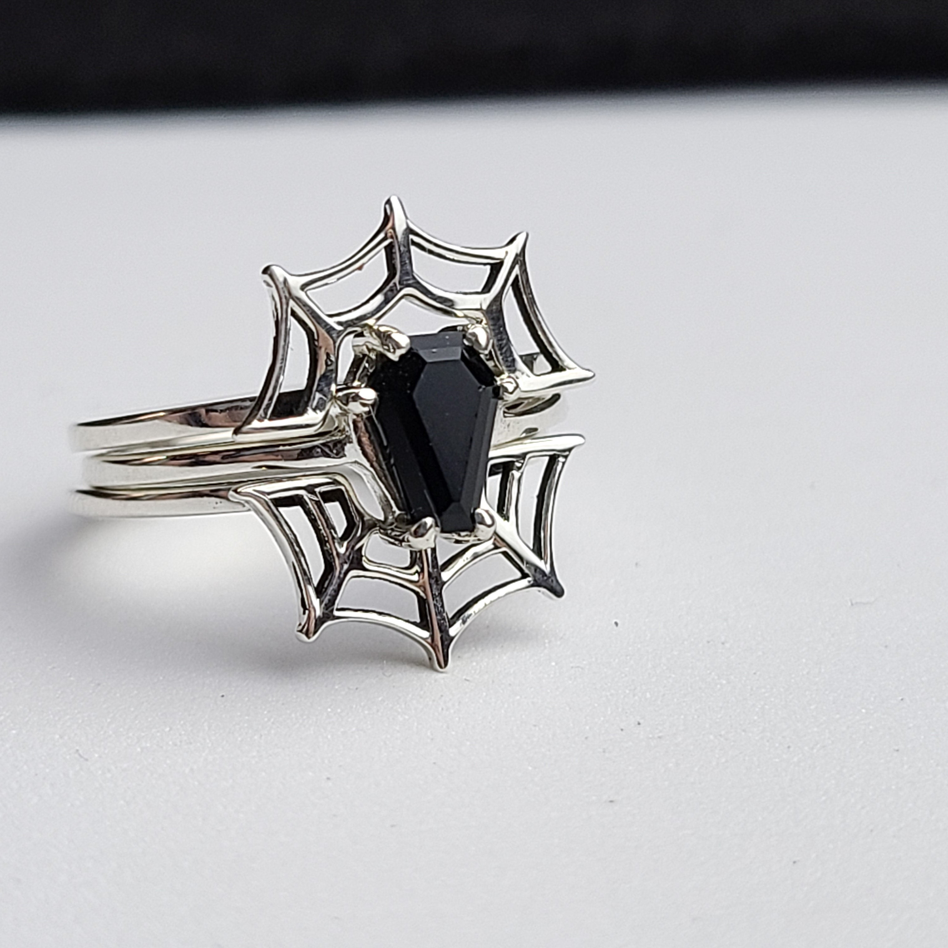 Collection of Black Coffin & Spider Web Ring Set in a gallery layout