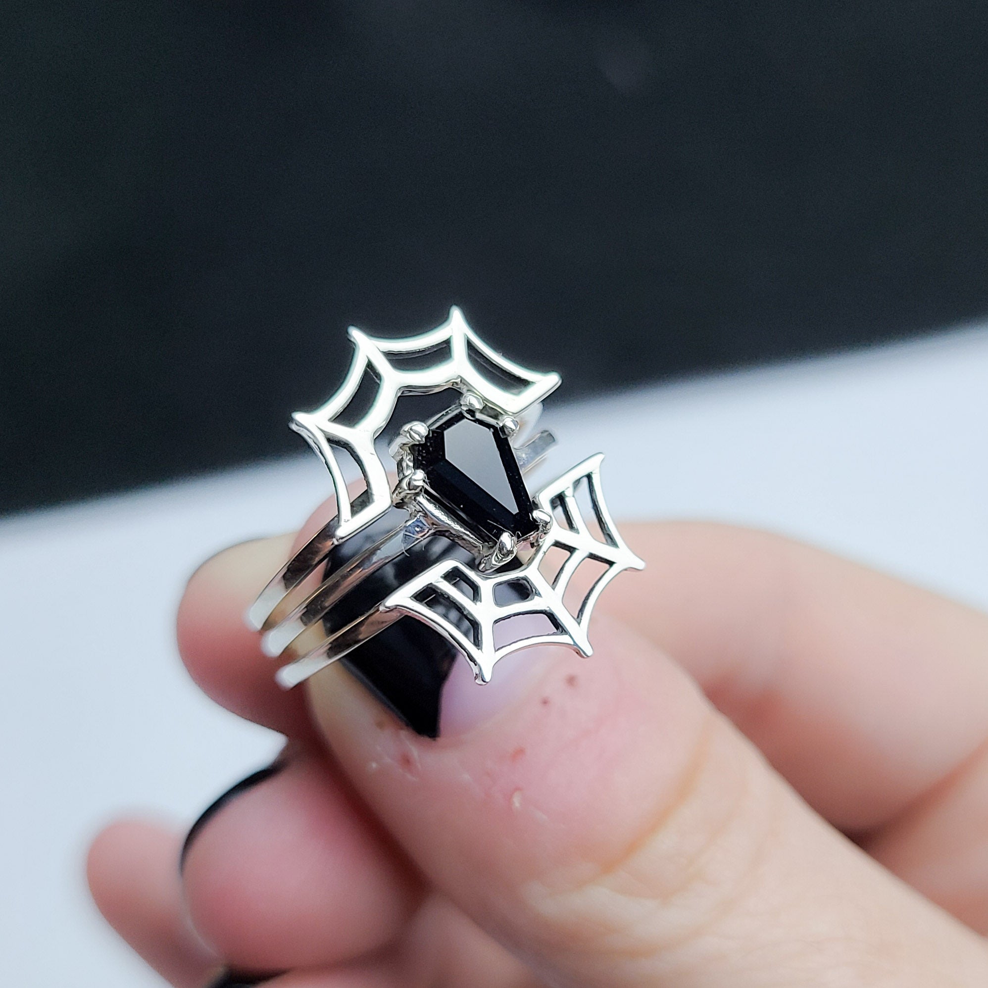 Collection of Black Coffin & Spider Web Ring Set in a gallery layout