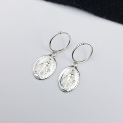 Collection of Oval Virgin Mary Medallion Hoop Earrings in a gallery layout