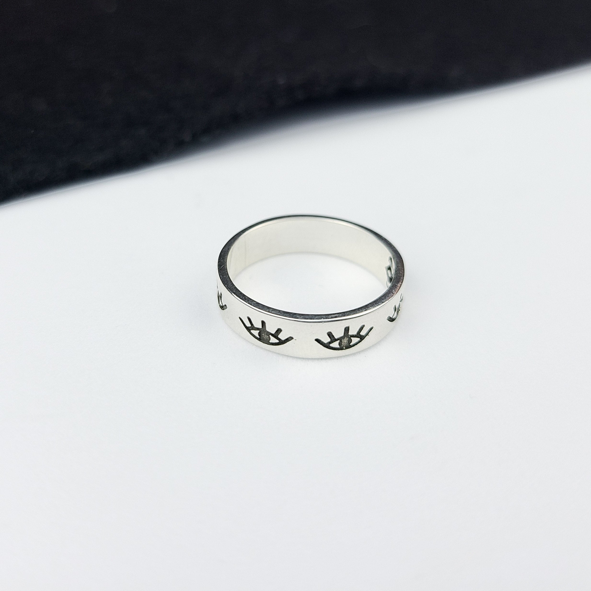 Collection of Silver Evil Eye Ring Band in a gallery layout