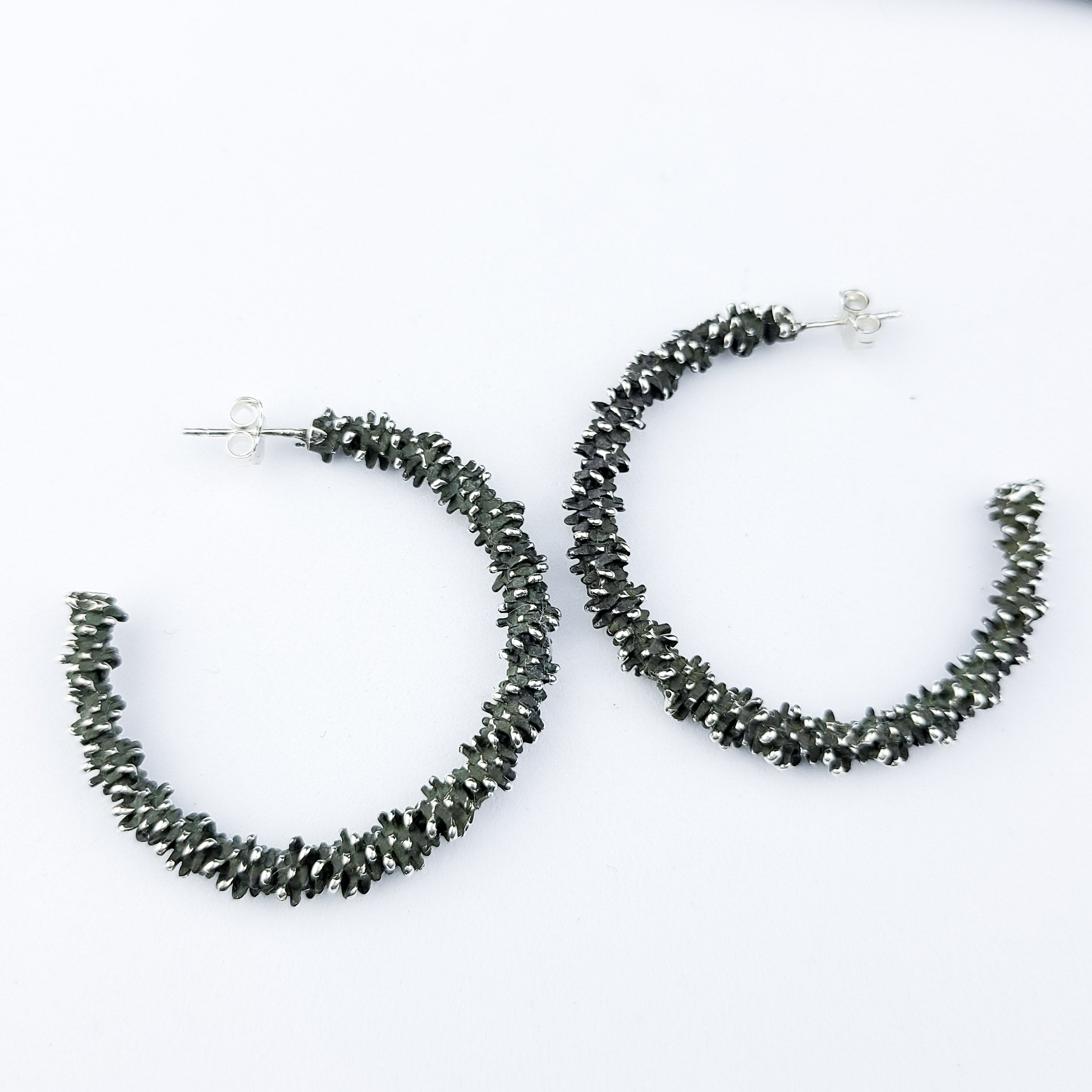 Collection of Silver Big Textured Hoops in a gallery layout