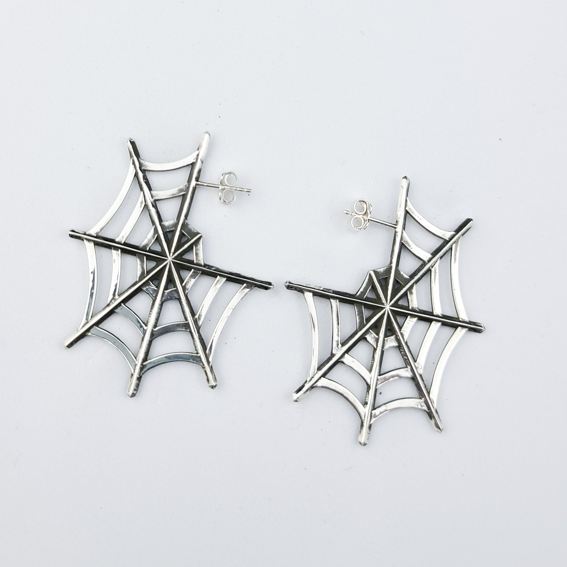 Collection of Silver Big Spider Web Hoops Earrings in a gallery layout