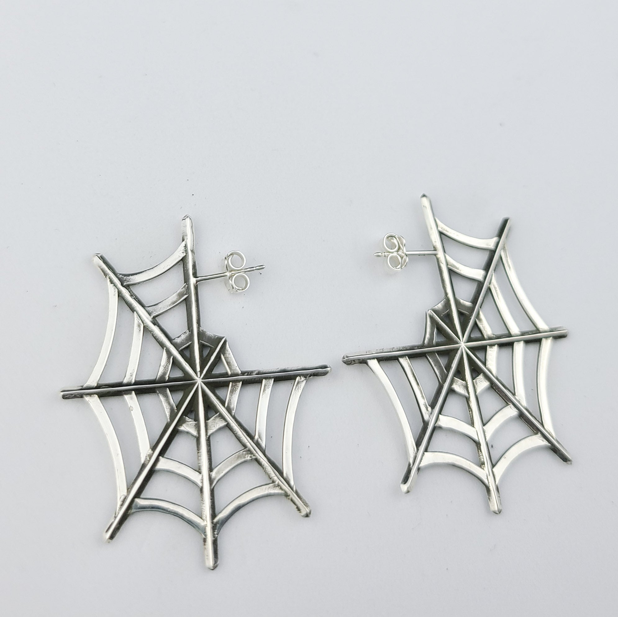 Collection of Silver Big Spider Web Hoops Earrings in a gallery layout
