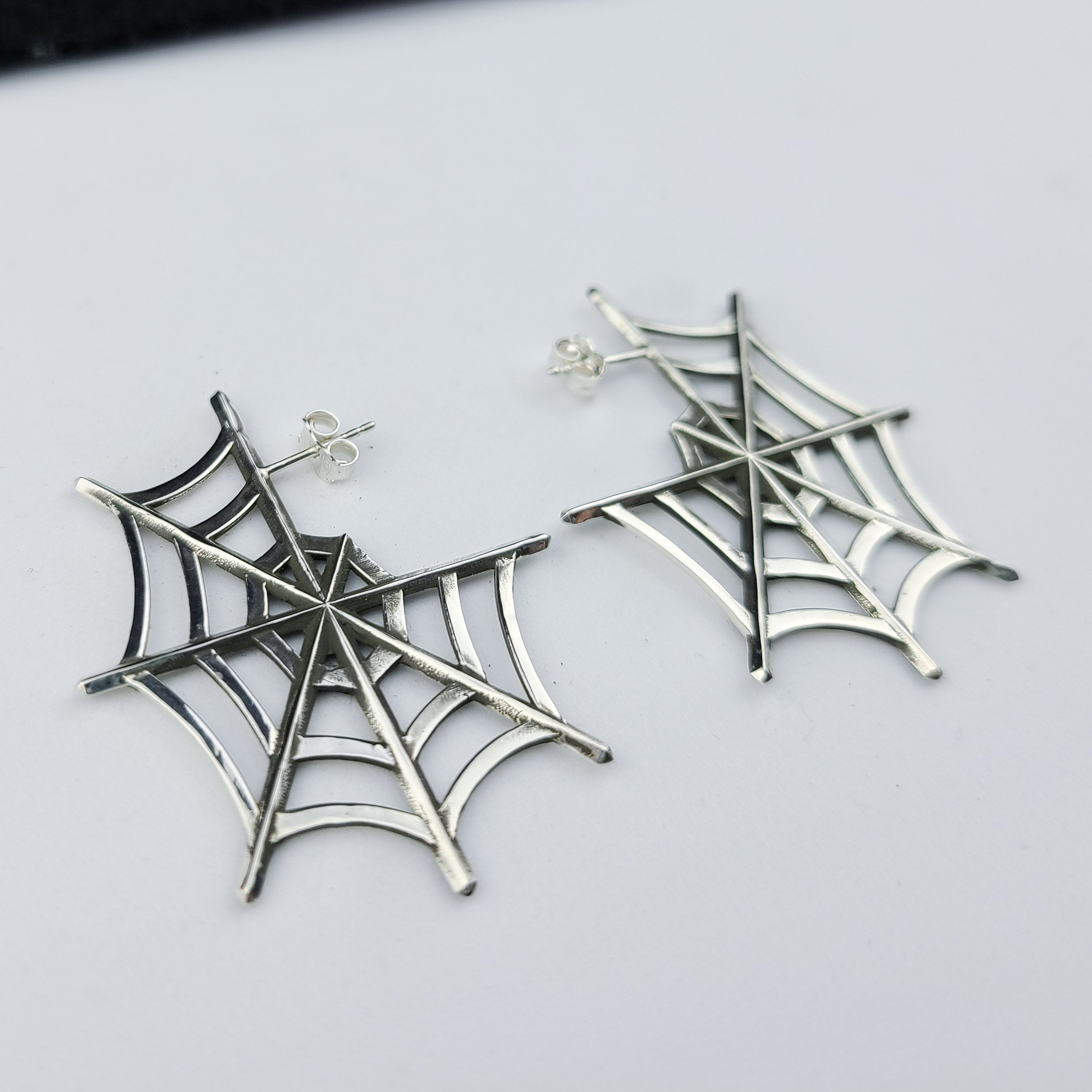Collection of Silver Big Spider Web Hoops Earrings in a gallery layout