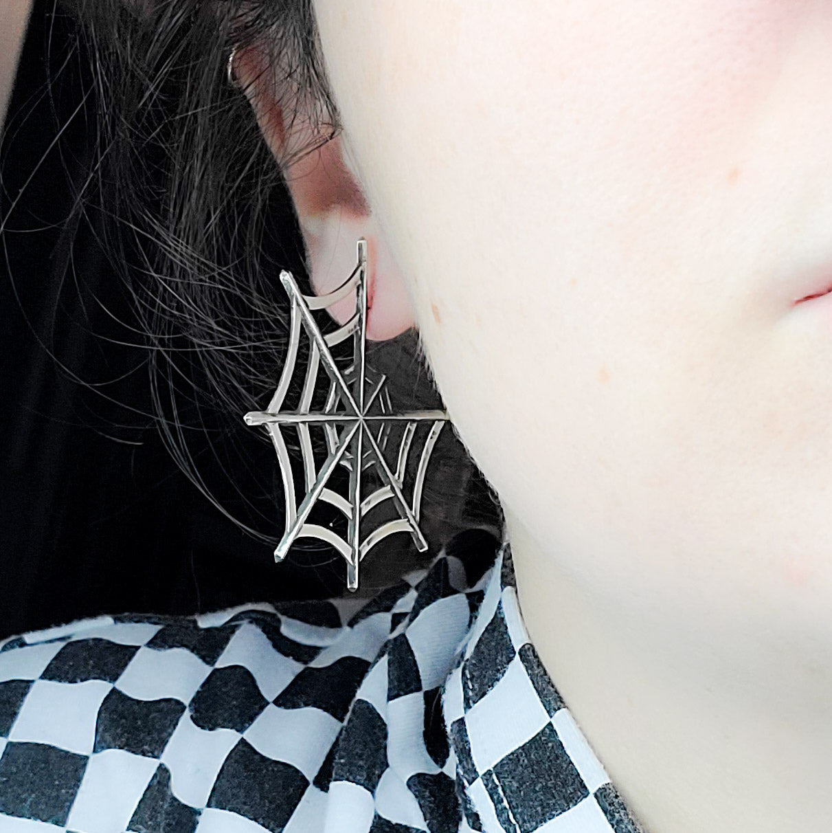 Collection of Silver Big Spider Web Hoops Earrings in a gallery layout