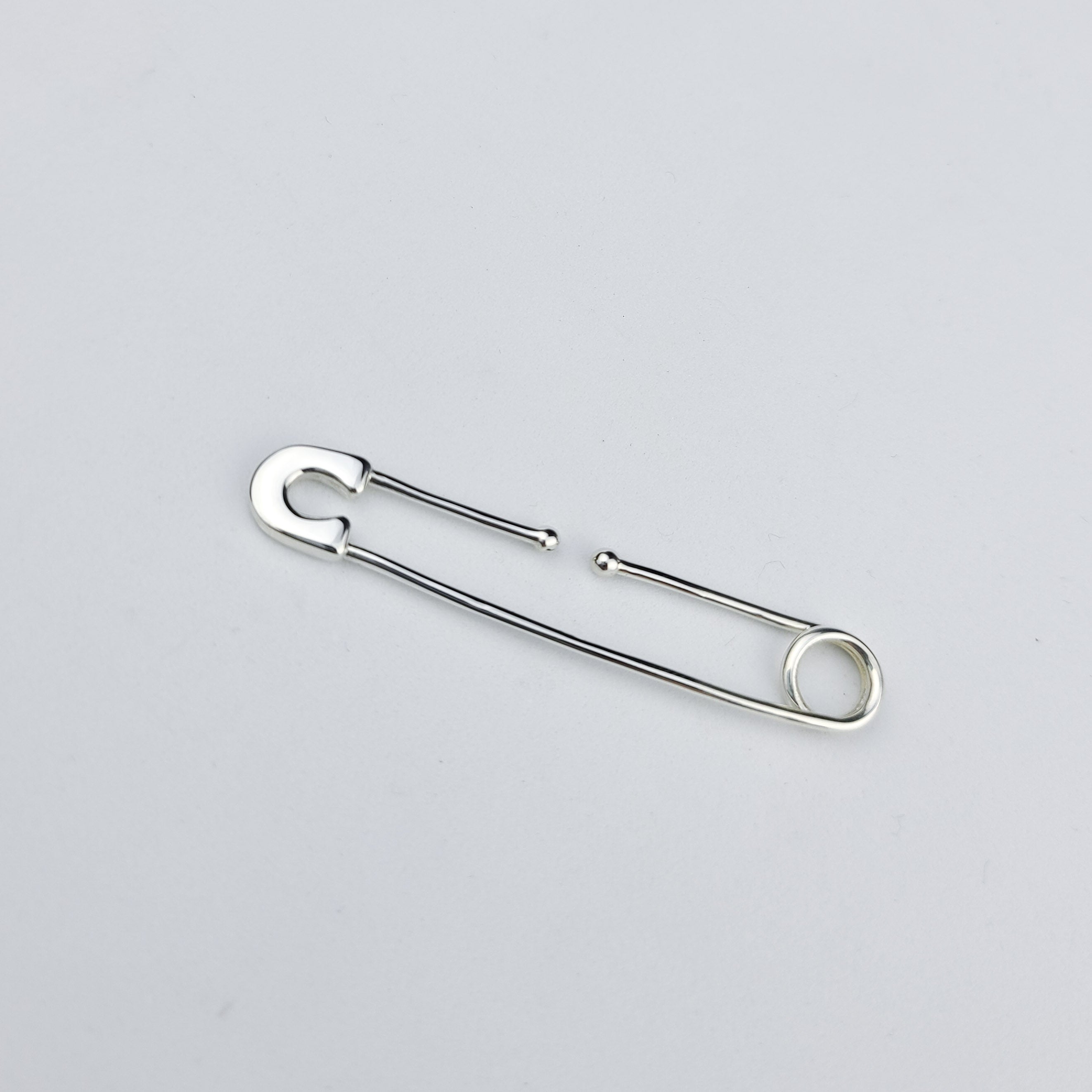 Collection of Bold Cheek Piercing Safety Pin in a gallery layout