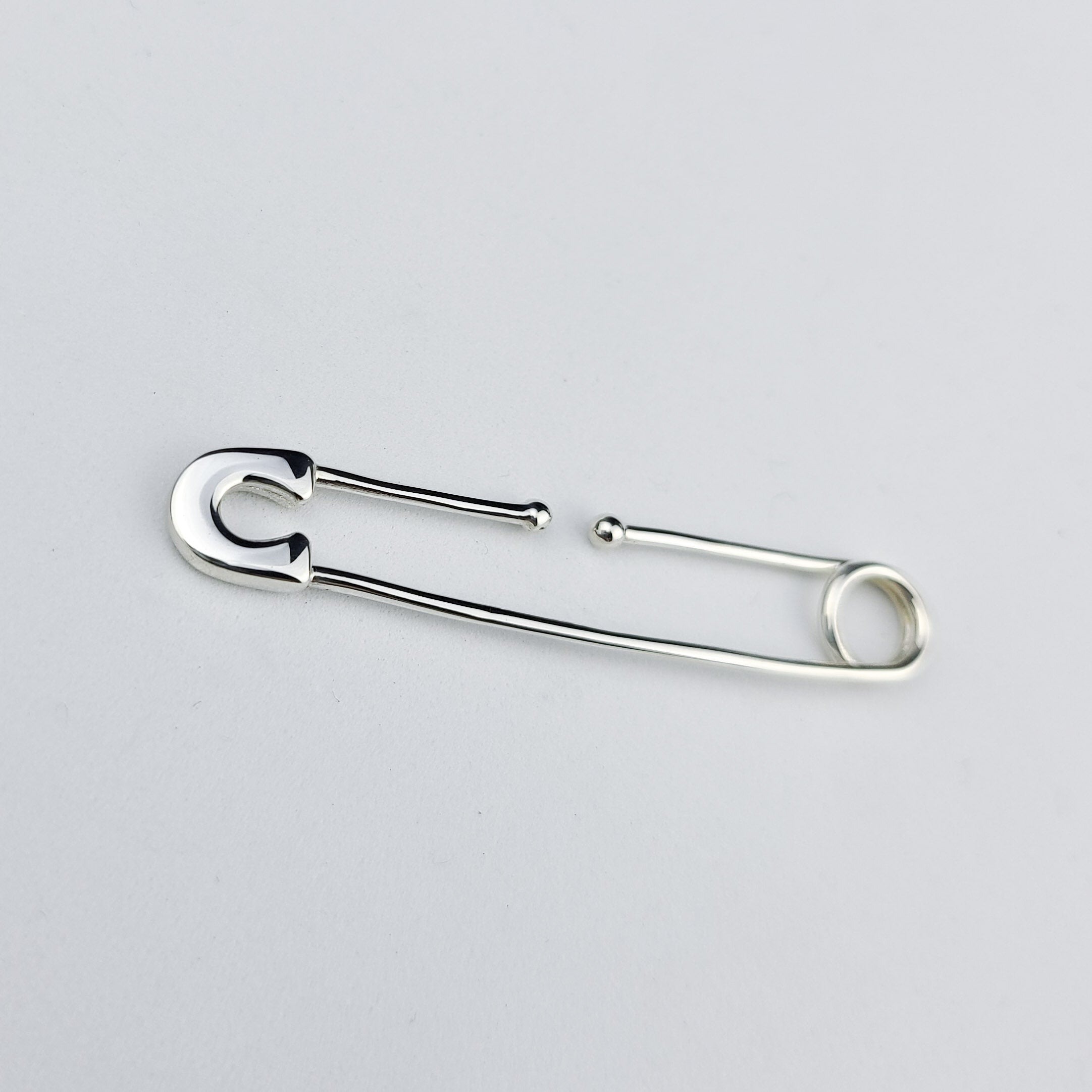 Collection of Bold FAKE Cheek Piercing Safety Pin in a gallery layout