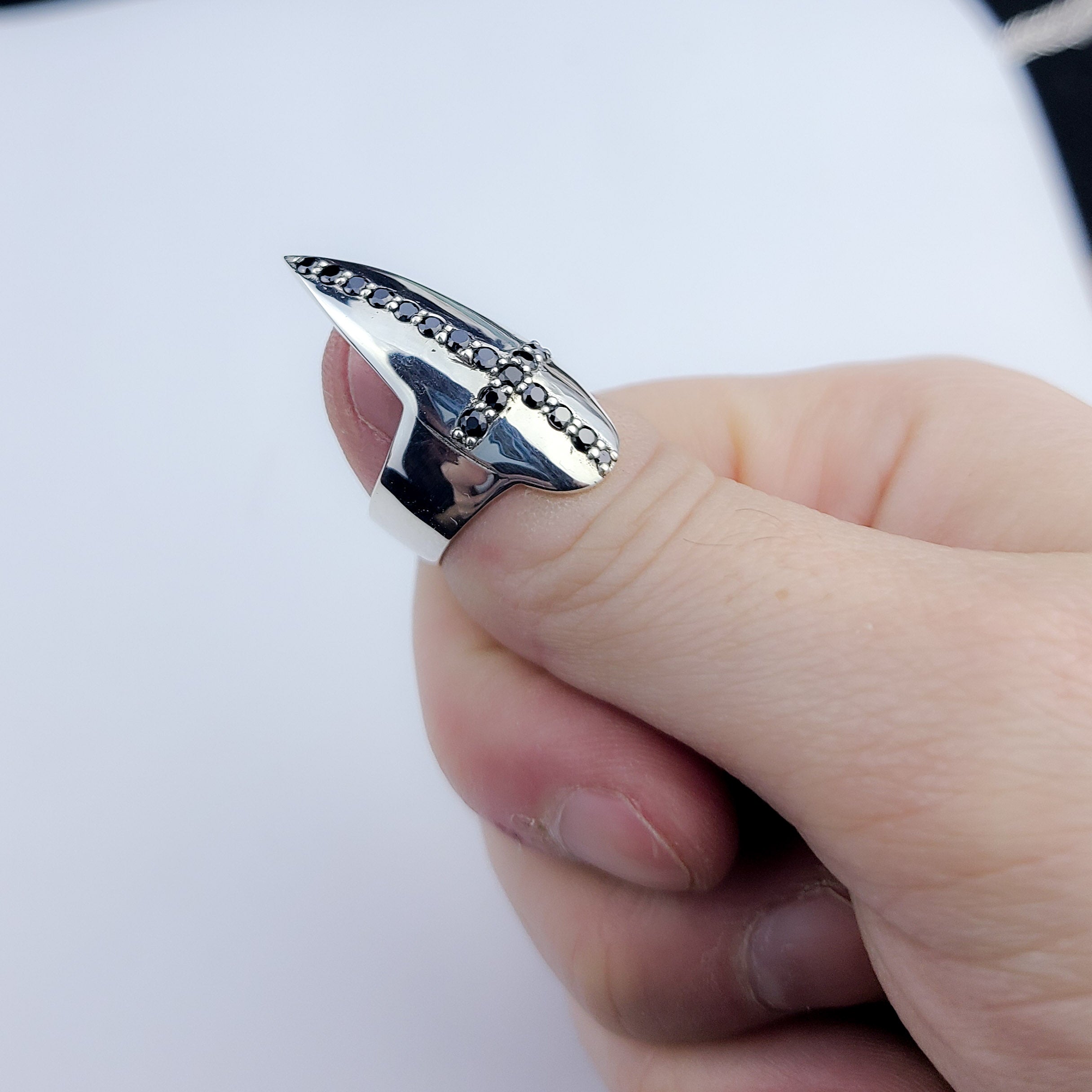 Collection of Black Diamond Cross Fake Nail Ring Claw in a gallery layout