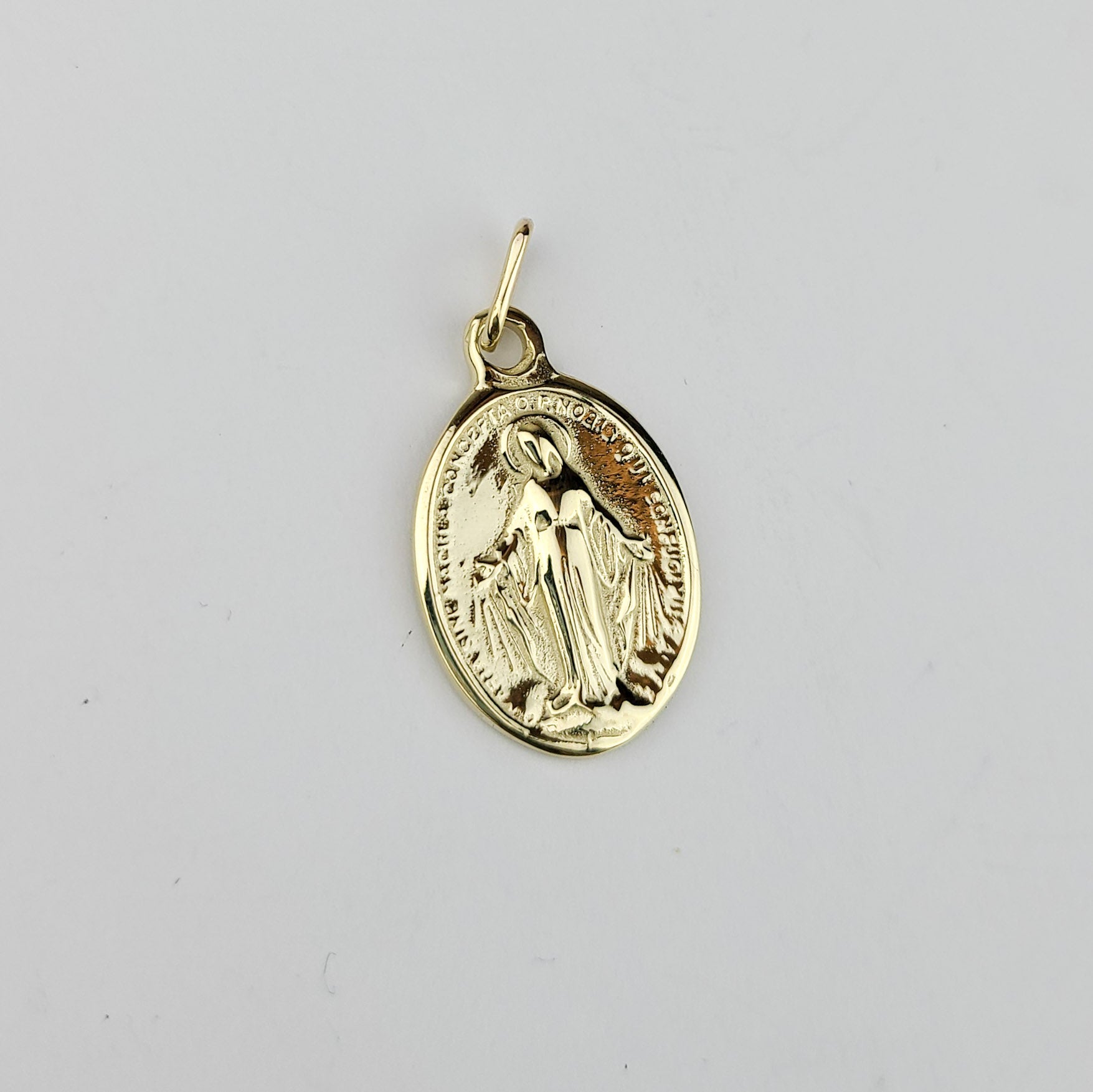 Collection of 10K - 14K Yellow Gold Mary Pendant in a gallery layout