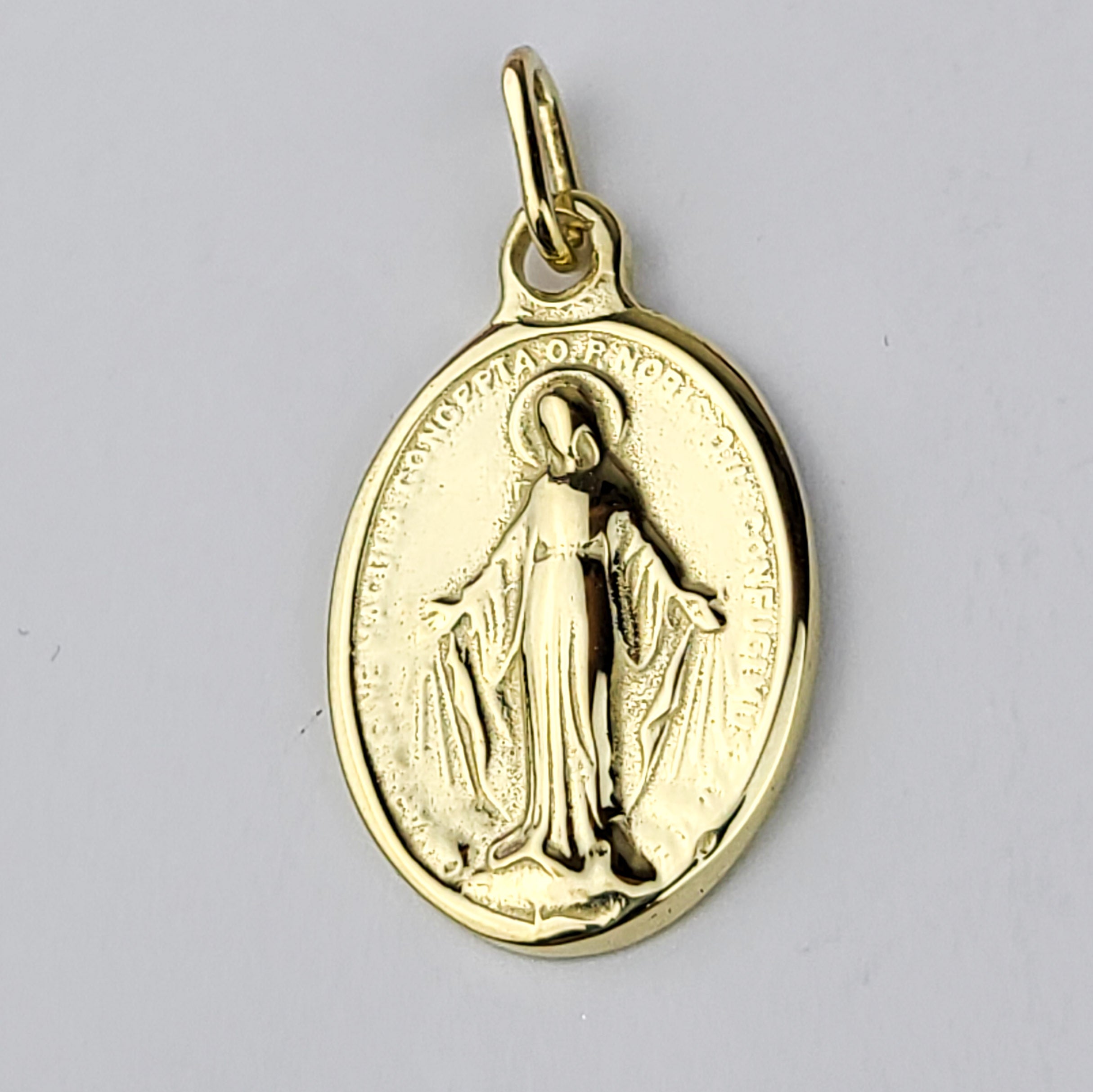 Collection of 10K - 14K Yellow Gold Mary Pendant in a gallery layout