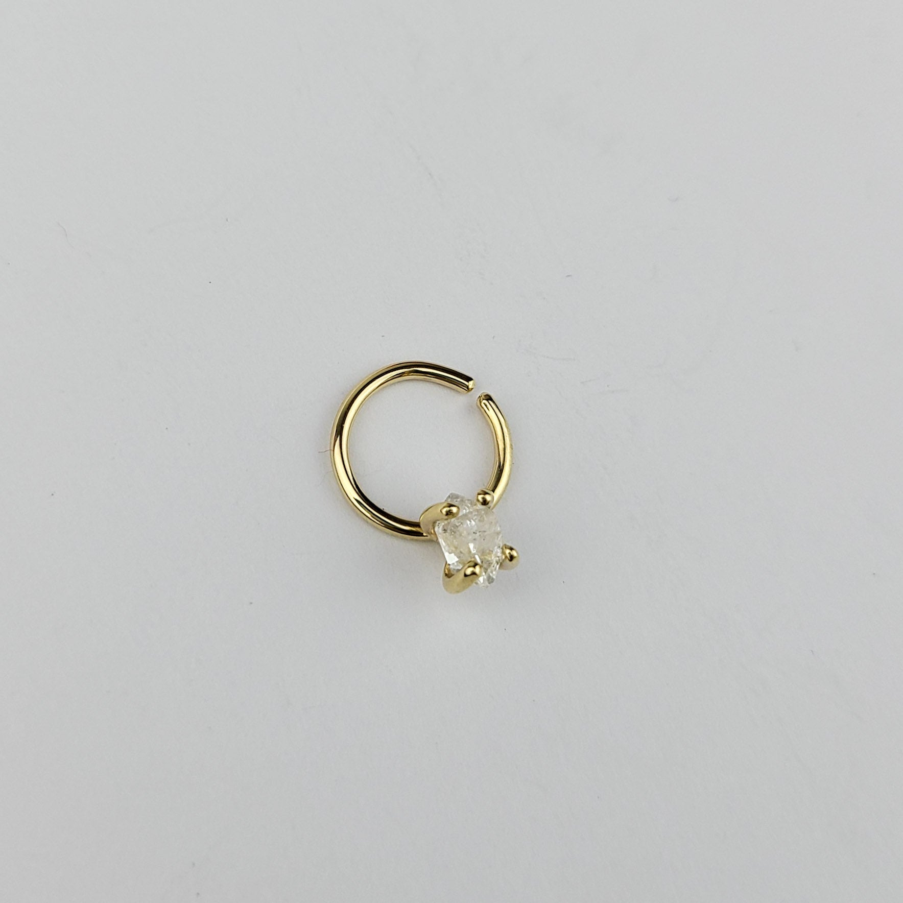 Collection of Piercing septum diamant Herkimer en or jaune 10K - 14K in a gallery layout