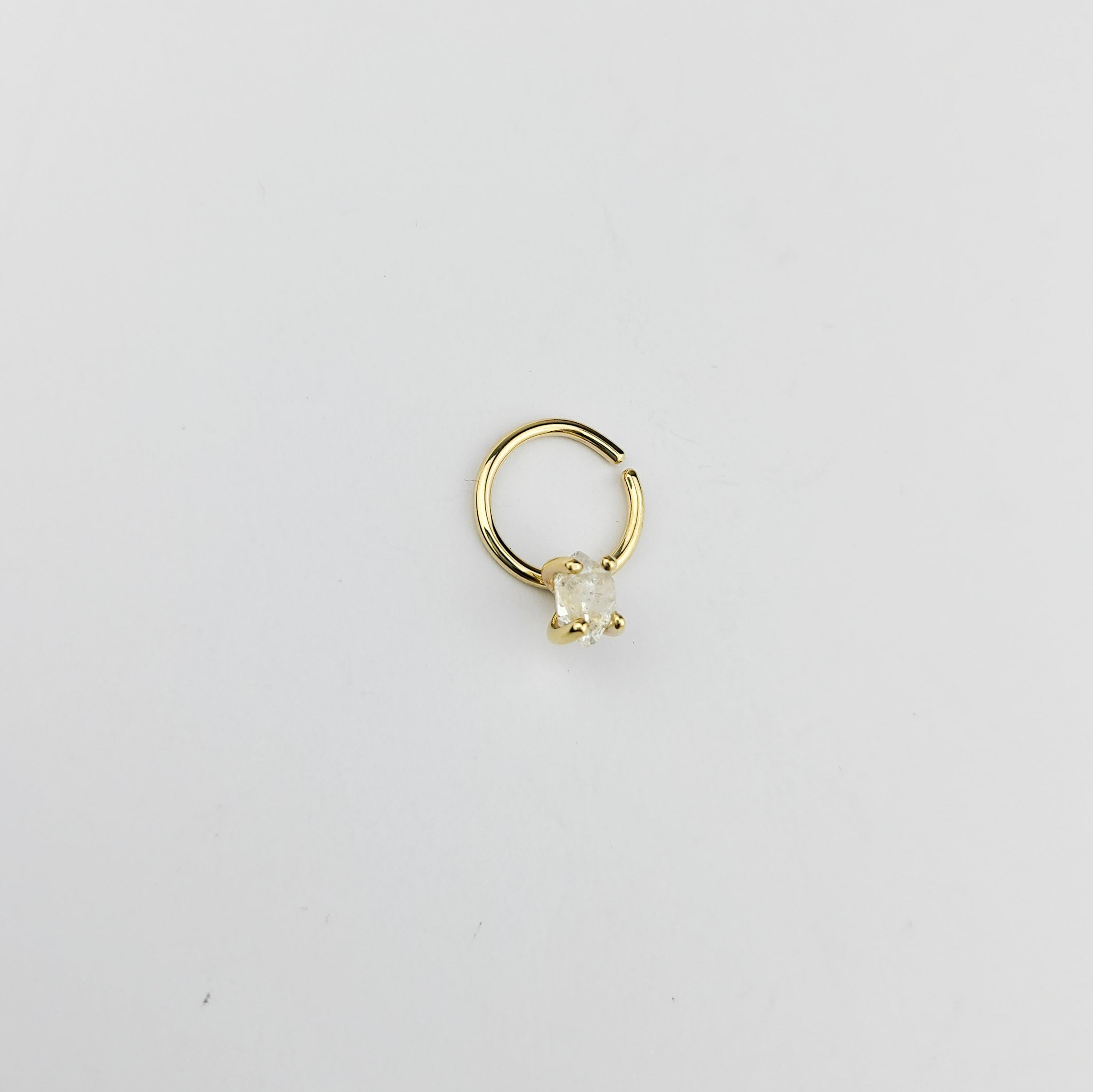 Collection of Piercing septum diamant Herkimer en or jaune 10K - 14K in a gallery layout