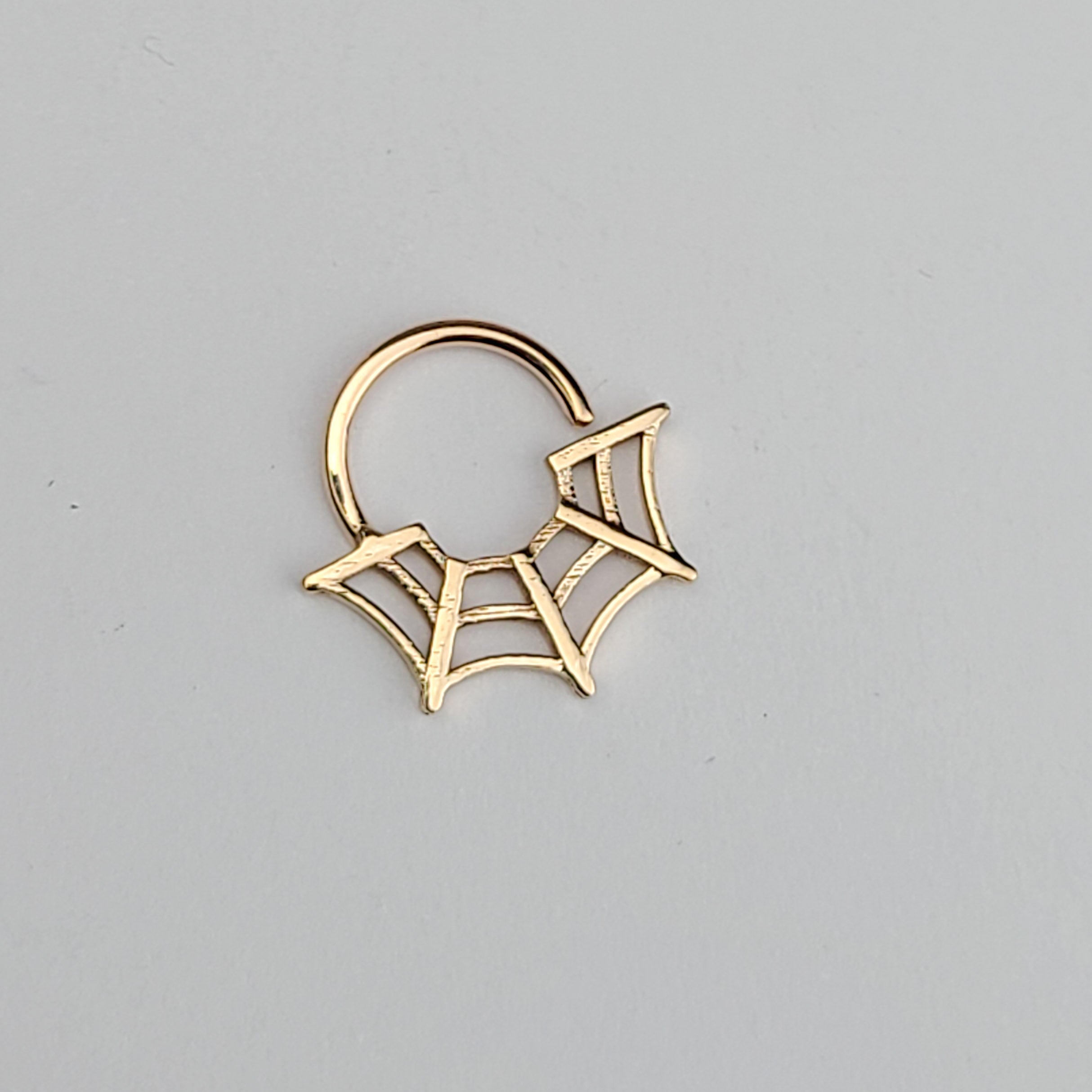 Collection of 10K - 14K Rose Gold Spider Web Halloween Septum Nose Ring in a gallery layout