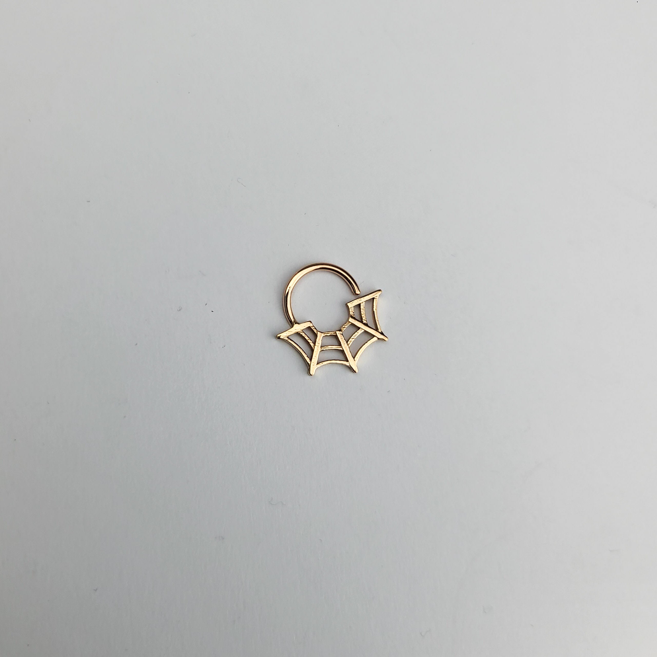 Collection of 10K - 14K Rose Gold Spider Web Halloween Septum Nose Ring in a gallery layout