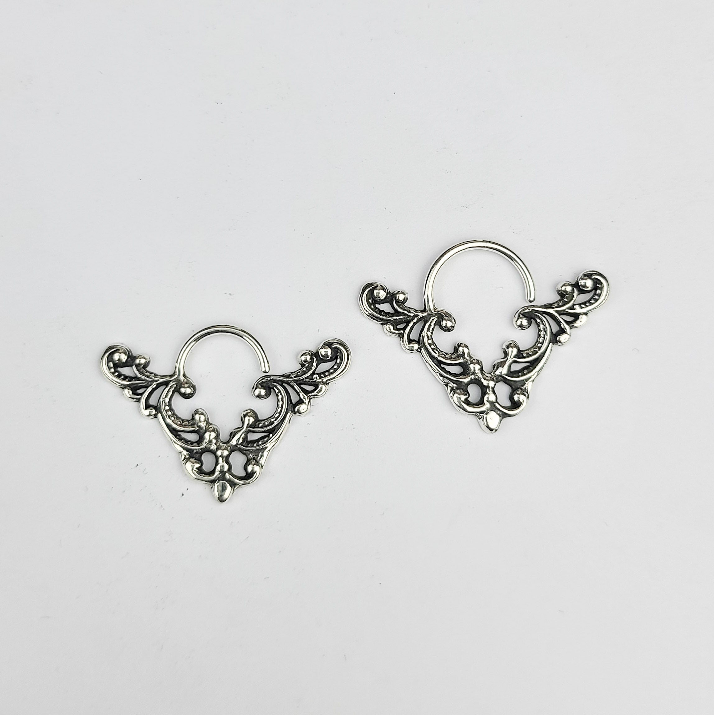 Collection of Big Lace Chevron Triangle Septum in a gallery layout