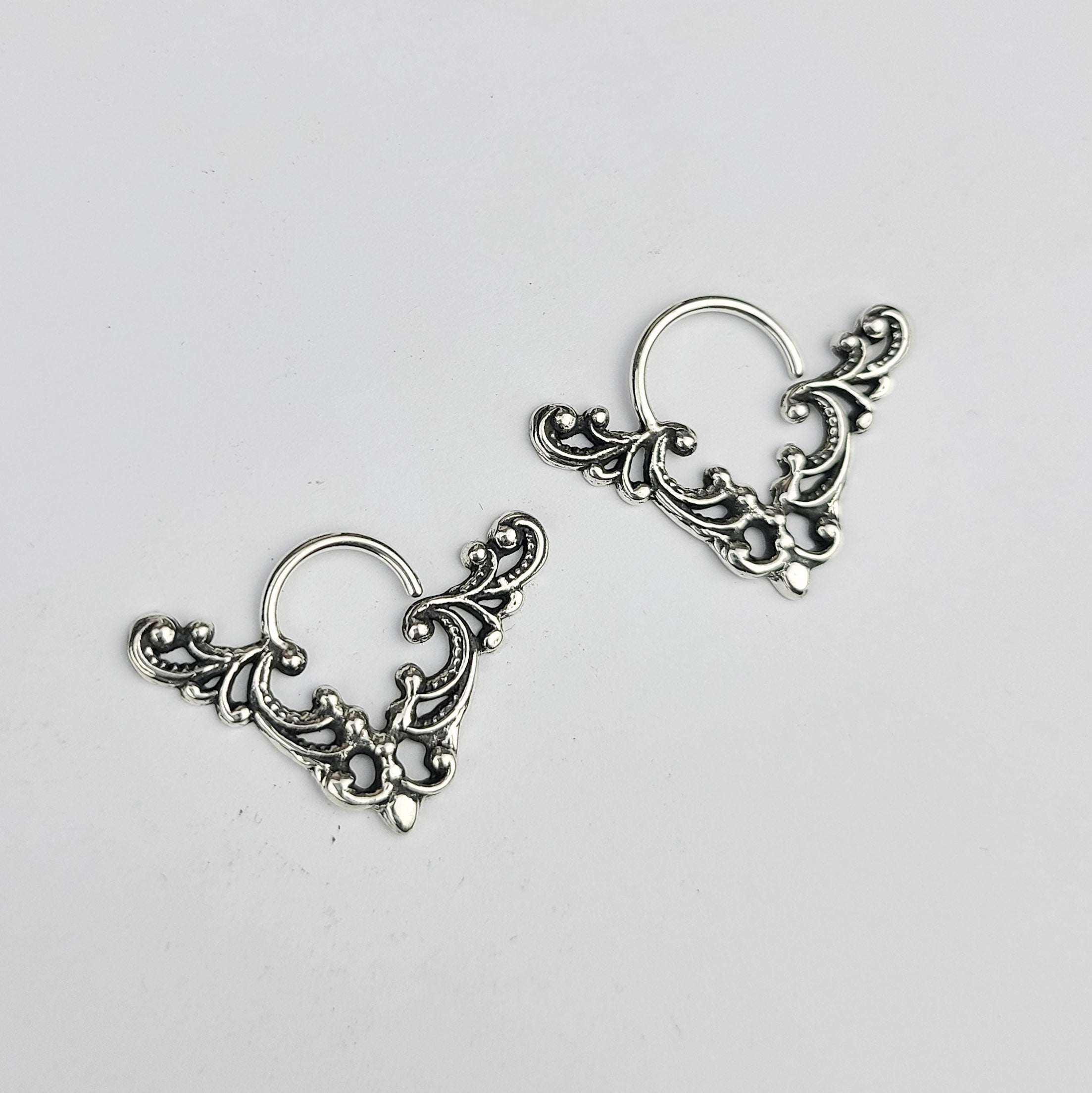 Collection of Big Lace Chevron Triangle Septum in a gallery layout