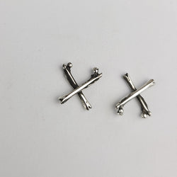 Collection of X Bone Earrings in a gallery layout