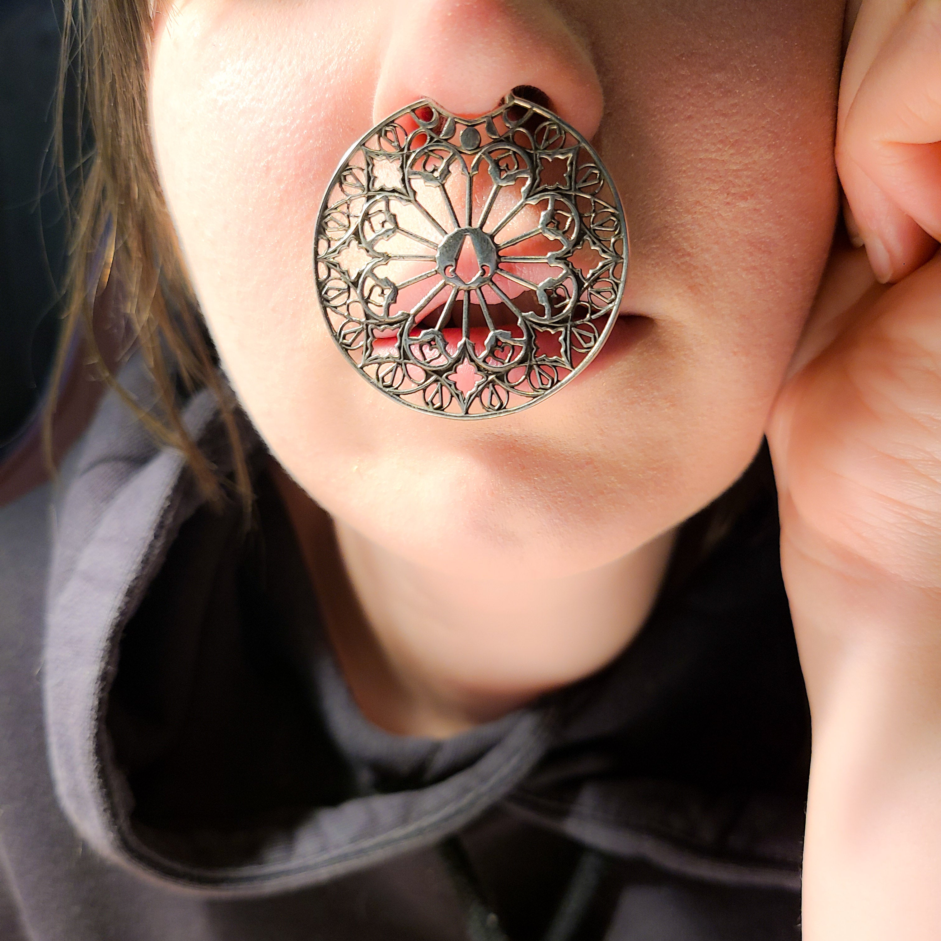 Oversized Moon Phase Cathedral Septum Piercing